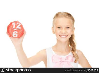 picture of girl holding alarm clock over white