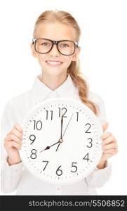 picture of girl holding big clock over white