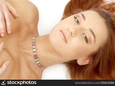 picture of green eyed redhead with collar on her neck