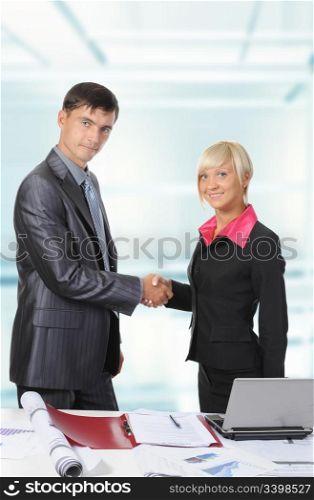 picture of handshake two business partners, when signing contract.