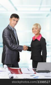 picture of handshake two business partners, when signing contract.