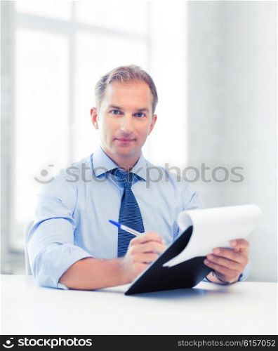 picture of handsome businessman taking employment inteview. businessman taking employment inteview