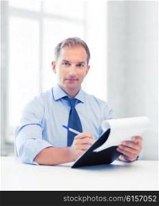 picture of handsome businessman taking employment inteview. businessman taking employment inteview