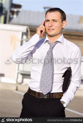 picture of handsome businessman with cell phone