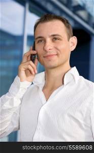 picture of handsome businessman with cell phone