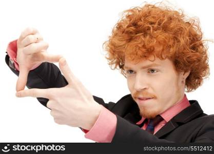 picture of handsome man creating a frame with fingers