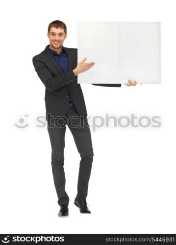 picture of handsome man in suit with a blank board.