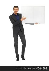 picture of handsome man in suit with a blank board.