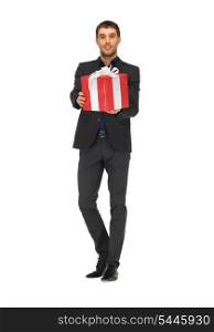 picture of handsome man in suit with a gift box.