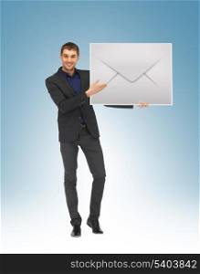 picture of handsome man showing virtual envelope