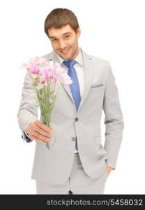 picture of handsome man with flowers in hand