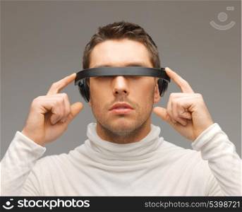 picture of handsome man with futuristic glasses.