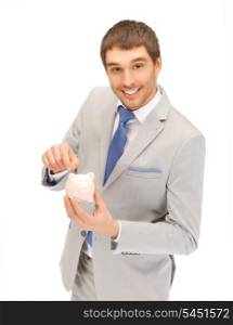 picture of handsome man with piggy bank...