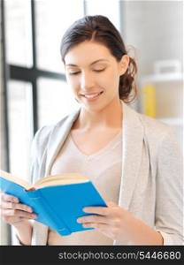 picture of happy and smiling woman with book