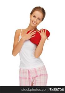 picture of happy and smiling woman with heart-shaped pillow