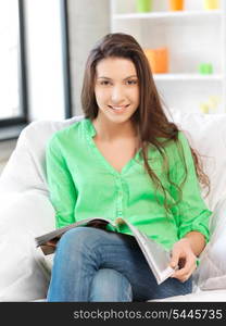 picture of happy and smiling woman with magazine