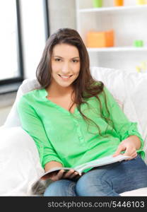 picture of happy and smiling woman with magazine