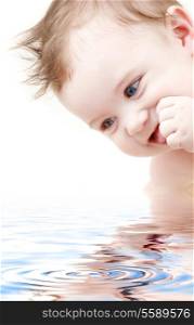 picture of happy blue-eyed baby boy in water