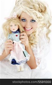 picture of happy bride with doll over white
