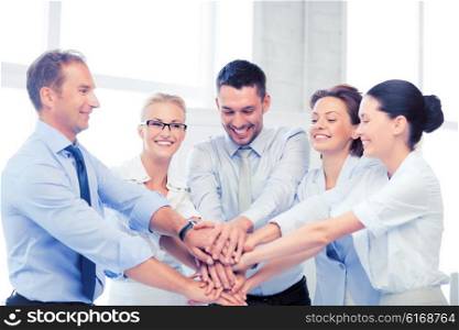 picture of happy business team celebrating victory in office. business team celebrating victory in office