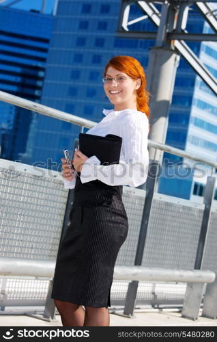picture of happy businesswoman in the city