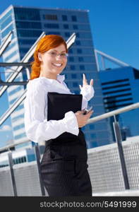 picture of happy businesswoman in the city