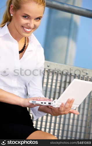 picture of happy businesswoman with laptop computer