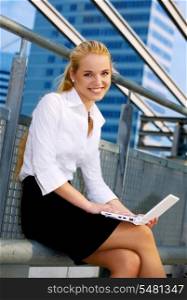 picture of happy businesswoman with laptop computer