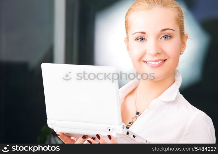 picture of happy businesswoman with laptop computer