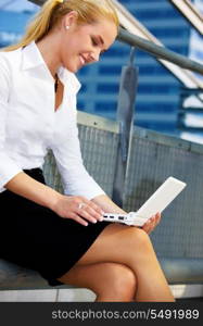 picture of happy businesswoman with laptop computer