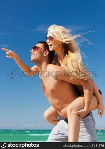 picture of happy couple having fun on the beach.