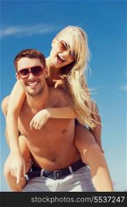 picture of happy couple having fun on the beach