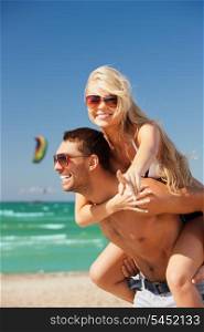 picture of happy couple in sunglasses on the beach. (focus on woman)