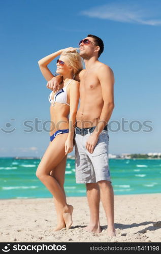 picture of happy couple on the beach