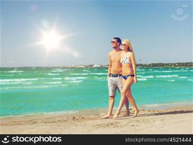 picture of happy couple walking on the beach.. couple walking on the beach
