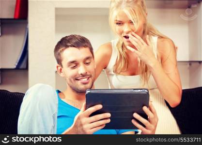 picture of happy couple with tablet pc computer