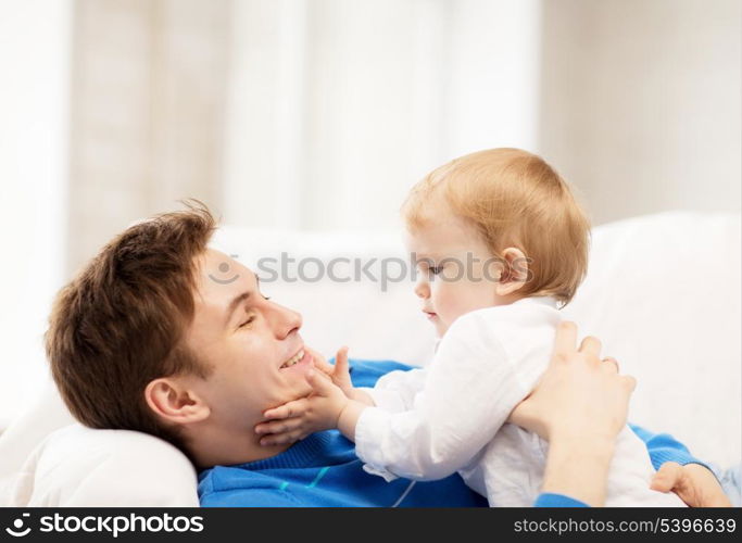 picture of happy father with adorable baby