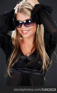 picture of happy girl in shades over black