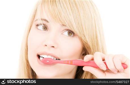 picture of happy girl with toothbrush over white