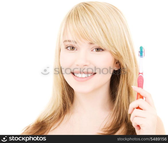 picture of happy girl with toothbrush over white