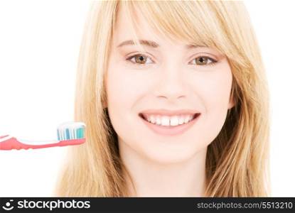 picture of happy girl with toothbrush over white