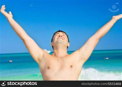 picture of happy man on the beach