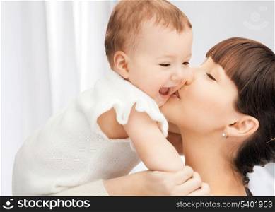 picture of happy mother with adorable baby (focus on woman)