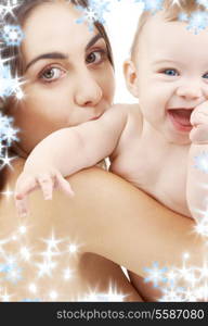 picture of happy mother with baby and snowflakes