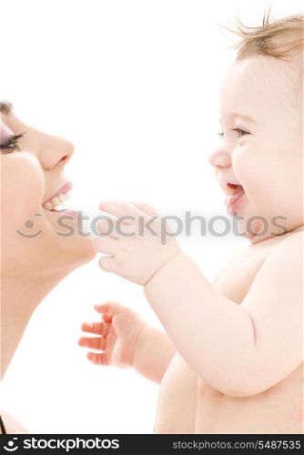 picture of happy mother with baby boy (focus on baby)