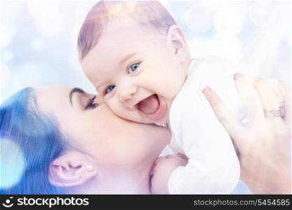 picture of happy mother with baby in hands