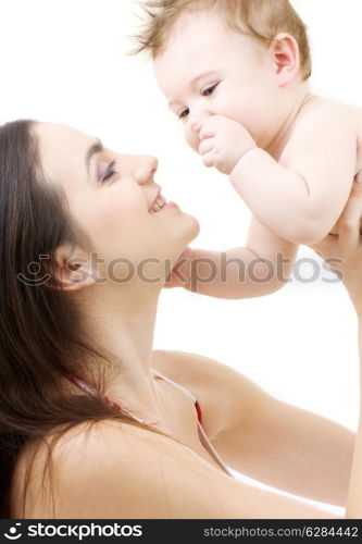 picture of happy mother with baby over white (focus on baby)