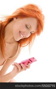 picture of happy redhead woman with cell phone