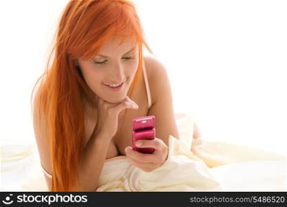 picture of happy redhead woman with cell phone&#xA;