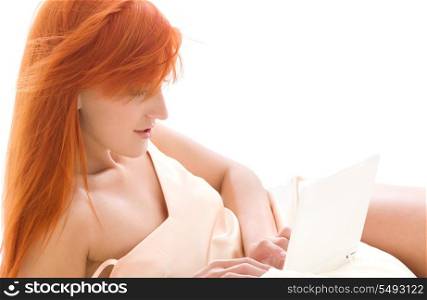 picture of happy redhead woman with laptop computer